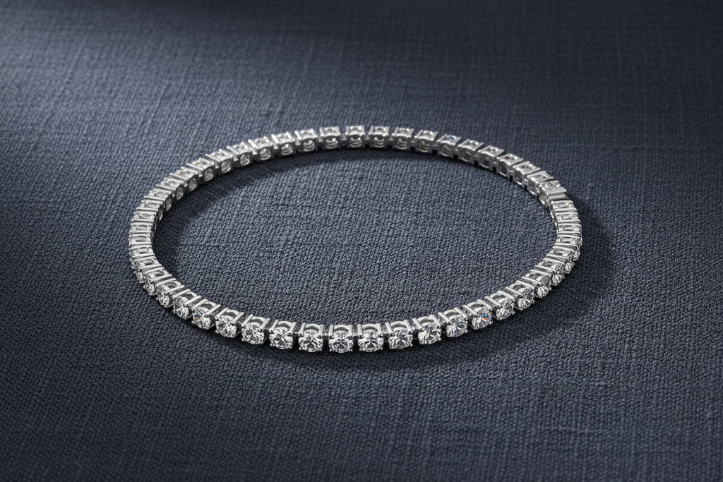 Tennis bracelet on dark slate linen fabric – luxury editorial photography